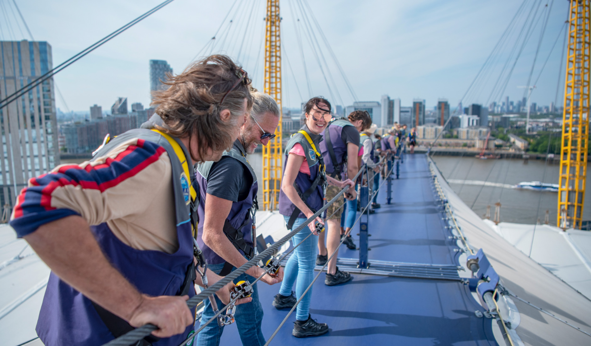 A group of people climbing Up at The O2